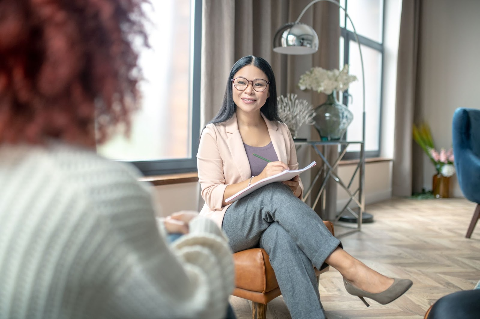 a life coach talking to a client
