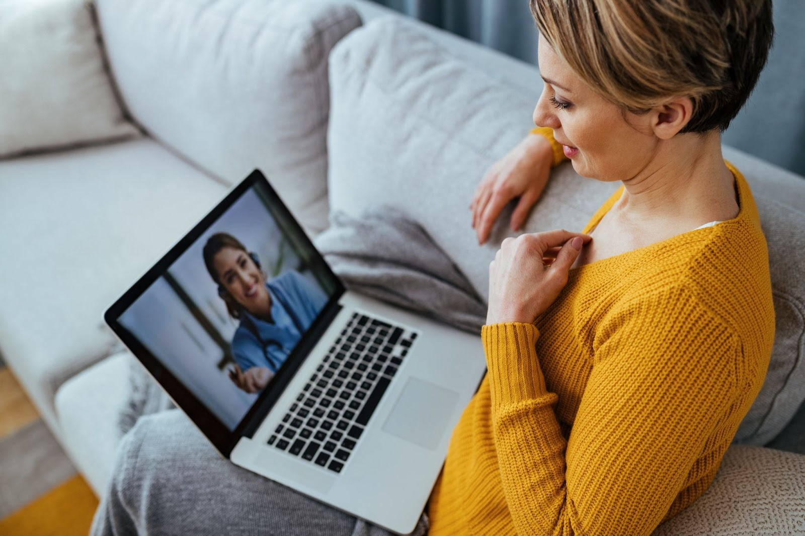 woman taking an online program on a laptop