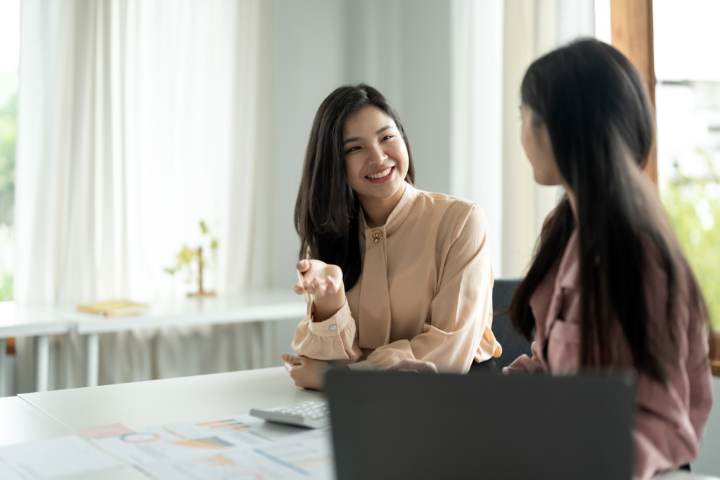 two business women talking